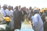 Governor, Central Bank of Nigeria, Mr Godwin Emefiele,( flanked to the left by) Acting Director, corporate communications CBN, Mr Isaac Okorafor, Kebbi state Governor, Senator Abubakar Atiku Bagudu, Jigawa state Deputy Governor, Alhaji Ibrahim Hassana, demonstrating threshing of rice in Auyo local Government Area of Jigawa State on Thursday, Nov. 10, 2016. 