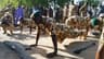 Chief of Army Staff (COAS), Major General Tukur Yusufu Buratai, leading soldiers on press-up exercise during his visit to the Boko Haram war front in Borno State on July 19, 2015.