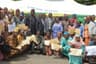 Representative of the Ogun State Governor and Head of Service, Mr. Abayomi Sobande (middle), Chief of Staff to the Governor, Chief Tolu Odebiyi (4th left), Commissioner for Urban and Physical Planning, Mrs. Ronke Sokefun (5th right) and Commissioner for Information and Strategy, Chief Adedayo Adeneye (4th right) with some of the beneficiaries who were presented with their Certificates of Occupancy (CoO) and land title documents under the Homeowners' Charter programme in Abeokuta on June 22, 2017.
