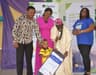 L-R: Father of N150,000.00 beneficiary of Fidelity Savings Loyalty Scheme (FSLS), Onyebuchi Gabriel; his wife, Ijeoma; N150,000.00 beneficiary of FSLS, Chiemere Great Gabriel; President, Lagos Chamber of Commerce and Industry (LCCI), Babatunde Ruwase; Executive Director, Shared Services and Products, Fidelity Bank, Chijioke Ugochukwu during the cheque presentation to beneficiaries of Fidelity Savings Loyalty Scheme at the Lagos International Trade Fair in Tafawa Balewa Square, Lagos. 