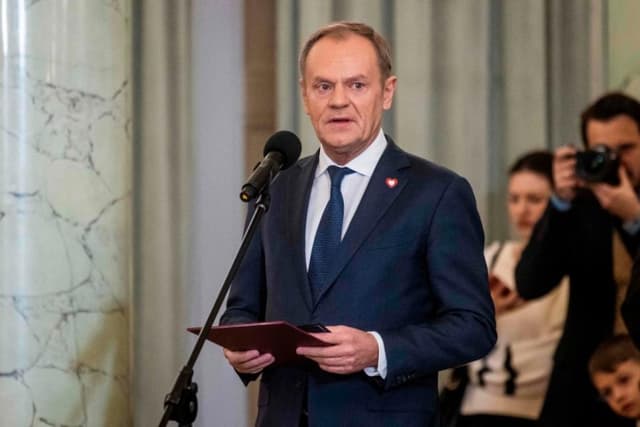 Poland to temporarily suspend right to asylum, PM Tusk says 