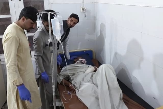 Dozens dead after gunmen attack passenger vehicles in Pakistan