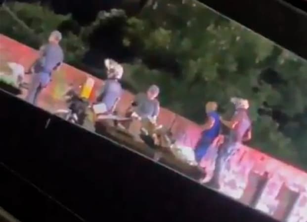 Video of military police officer throwing man off bridge sparks anger