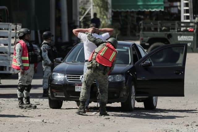 Holidaying US couple shot dead as gunmen open fire on vehicle