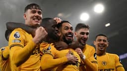 Cunha scores from corner as Wolves beat 10-man Man Utd