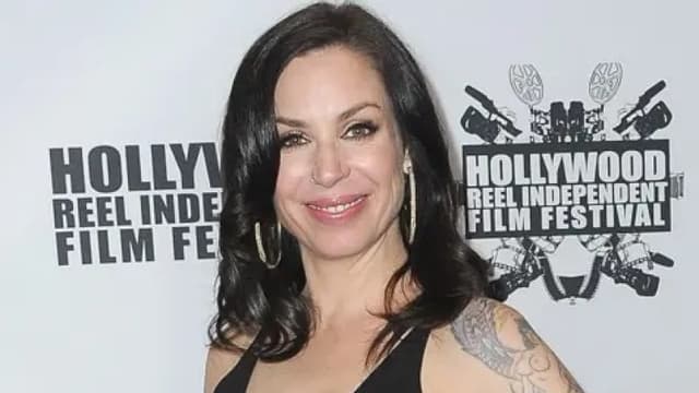 Author shot by police after backyard stand-off