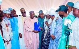 Governor tears defectors’ PDP membership cards, opposition party demands apology