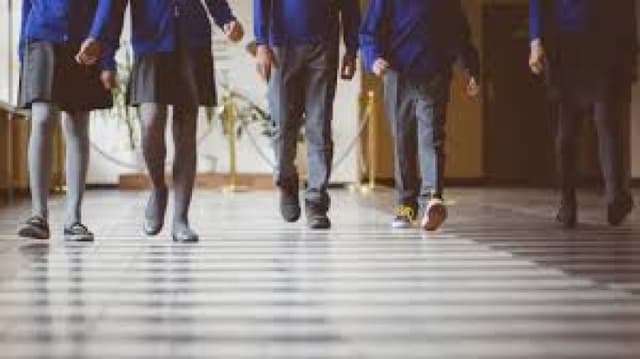 Parents protest as British school imposes hour-long detentions for pupils talking in corridors between lessons