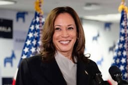 Kamala Harris steps back into limelight with speech criticizing Trump as he celebrates his first 100 days