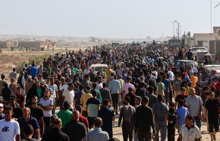 Chaos erupts on first day of US-backed aid distribution in Gaza after weeks of hunger