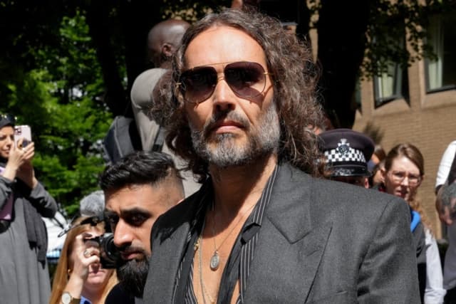 Comedian Russell Brand pleads not guilty to rape, sexual assault