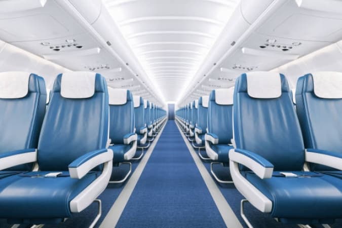 Man abandons grieving partner in economy after getting a free upgrade to business class on 14-hour flight