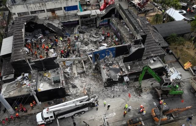 Owners of collapsed nightclub arrested for death of 236