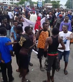 Youths block highway, protest 16 years of darkness in Delta community