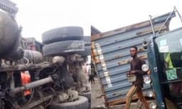 One dead, three rescued as 40ft container crushes minibus in Lagos