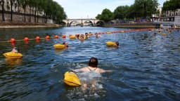 River Seine reopens to swimmers in Paris after century-long ban (BBC)