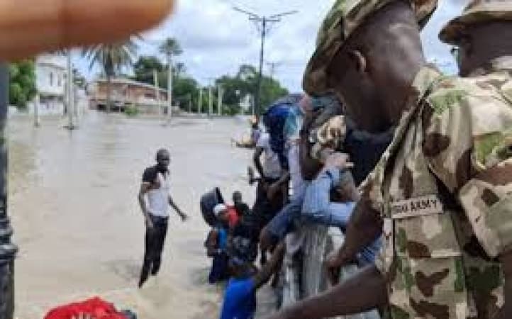 Soldier rescued from drowning in ravaging flood