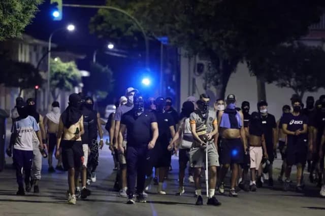 14 people arrested after anti-migrant riots in southern Spain