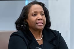 Lawyers clash over fate of Fed governor Trump tried to fire