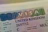 UK cancels unprecedented number of migrant work visas