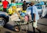 Wheelbarrow pusher stabs customer to death, steals belongings