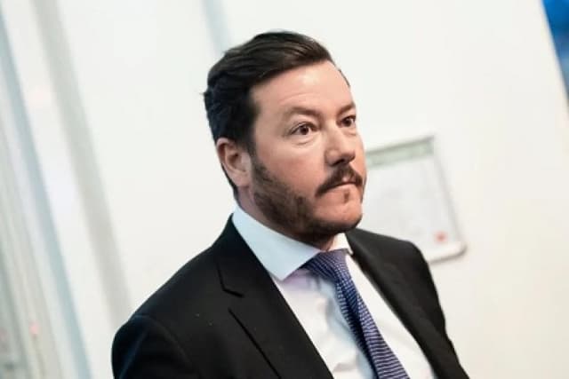 Fallen billionaire on trial over alleged real estate fraud