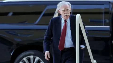 Bolton pleads not guilty to charges of sharing classified information