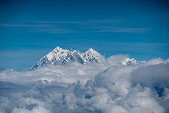 French national and Nepali guides among three killed in avalanche on Nepal mountain, other foreign climbers missing