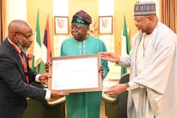 Tinubu receives Nigerian scholar, Prof. Ademola Adenle, winner, inaugural world academy of aciences–M.S. Swaminathan award for food and peace