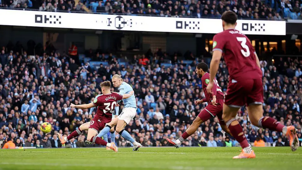 Haaland scores twice as Man City win to move top