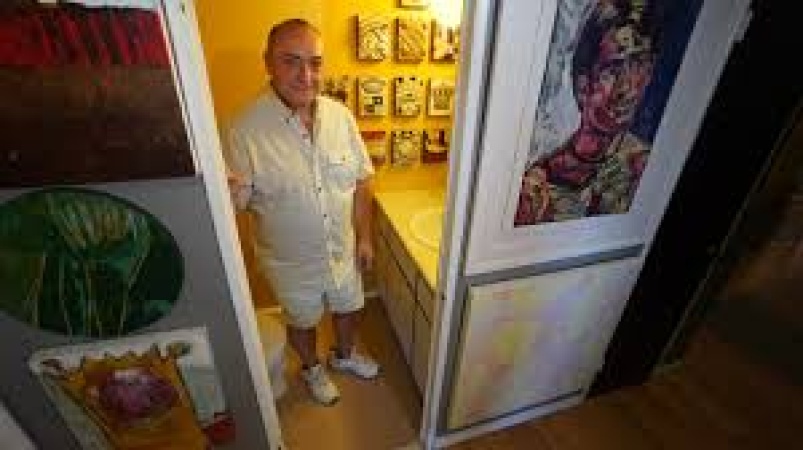 He gave away his art after learning he had 18 months to live. Now his cancer's in remission