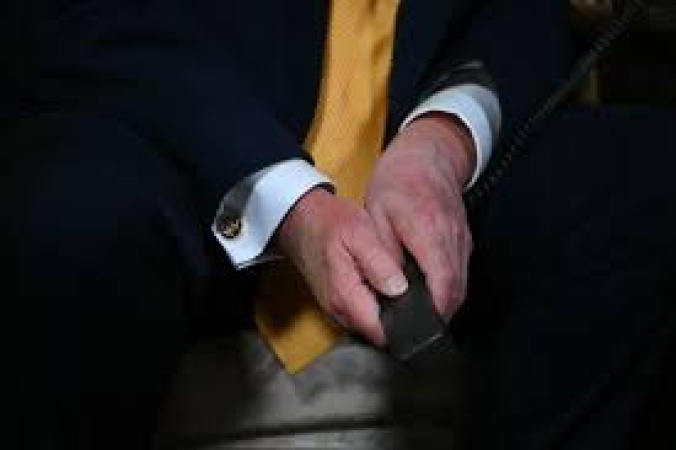 Bruising on Trump’s left hand sparks renewed questions about his health