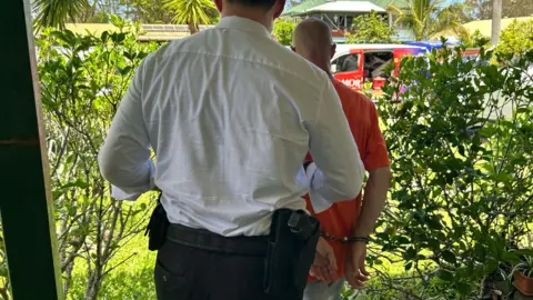 Australia to deport British man charged with displaying Nazi symbols