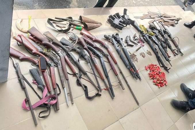 80 militants surrender arms