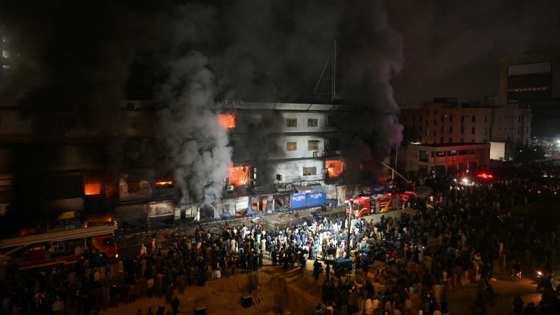 Dozens missing, six dead after huge blaze in Pakistan shopping mall
