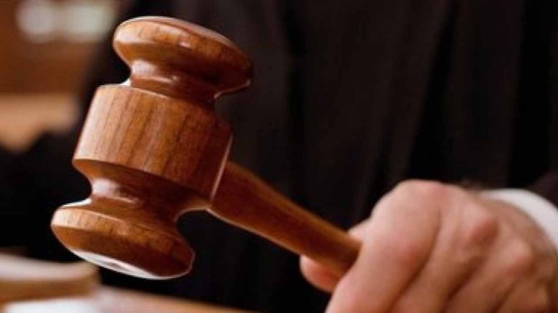 Housewife docked for allegedly pouring hot water on husband