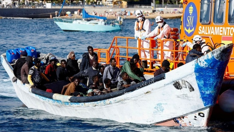 Spain to legalise up to 500,000 migrants in residency amnesty as workers welcome plan
