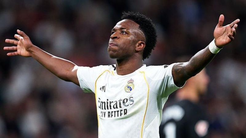 Vinicius scores twice as Real beat Atletico in thriller