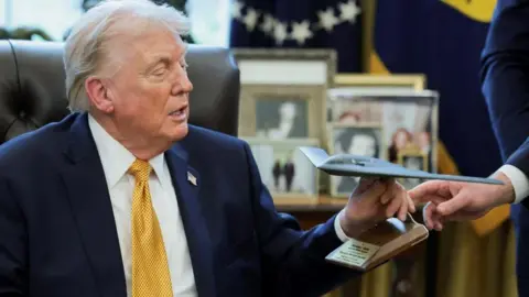 Surge in US gas prices deepens political peril for Trump over Iran