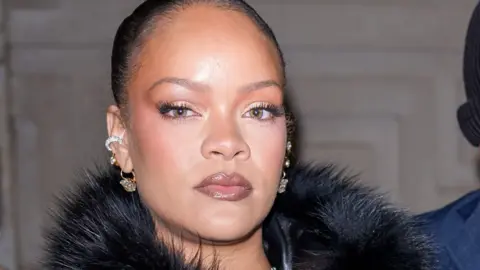 Woman charged with attempted murder after shooting at Rihanna's home