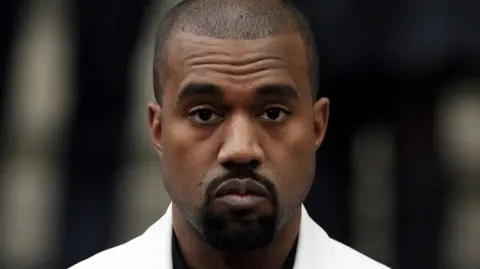 Pressure mounts over Kanye West's UK festival appearance