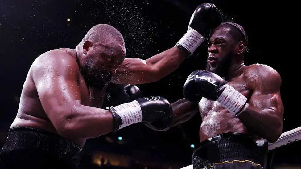 Chisora beaten by Wilder in captivating bout