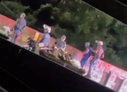 Video of military police officer throwing man off bridge sparks anger