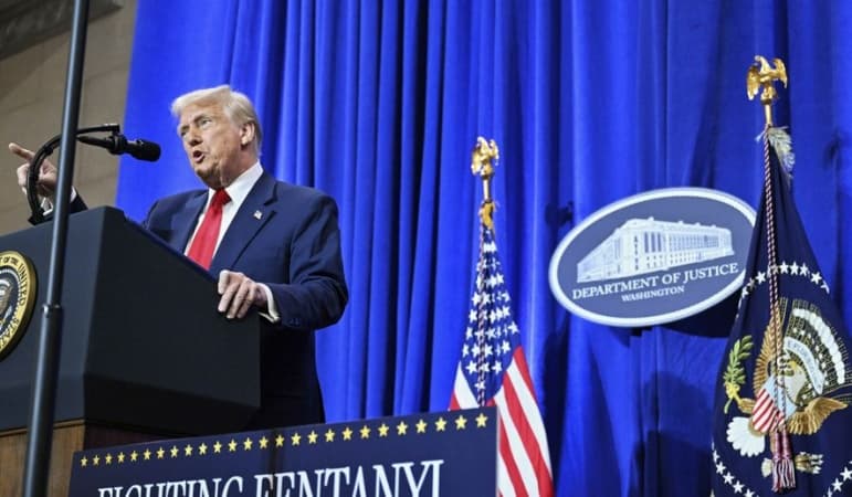 Trump threatens opponents with jail in Justice Department speech