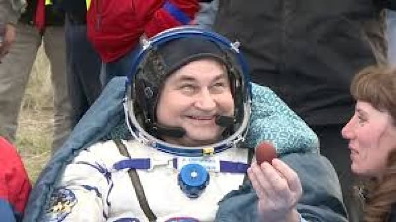 Oldest serving US astronaut returns to Earth on 70th birthday