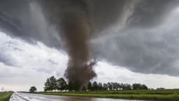 Twenty One dead after tornadoes tear through US states