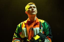 Music star charged with terrorism offense over alleged Hezbollah flag