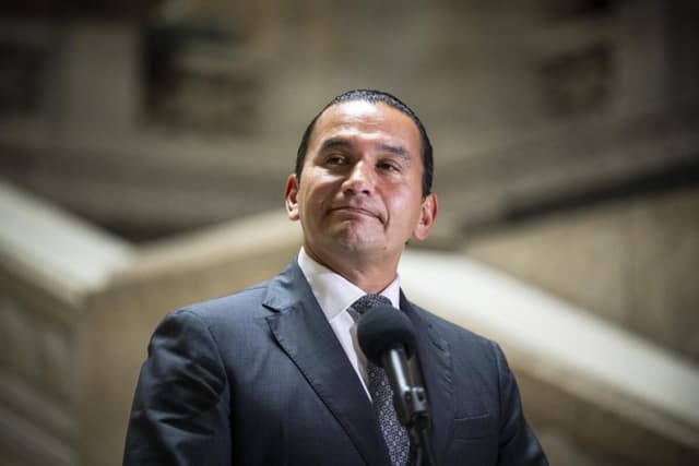 Thousands flee wildfire in Manitoba as 'out of control' blazes burn across Canada