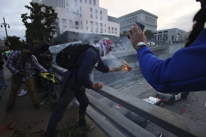 Trump deploys more troops as immigration riots escalate