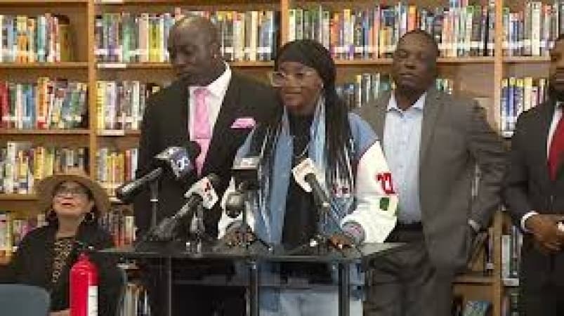 Family threatens legal action after track star is disqualified over celebration paying homage to Olympian